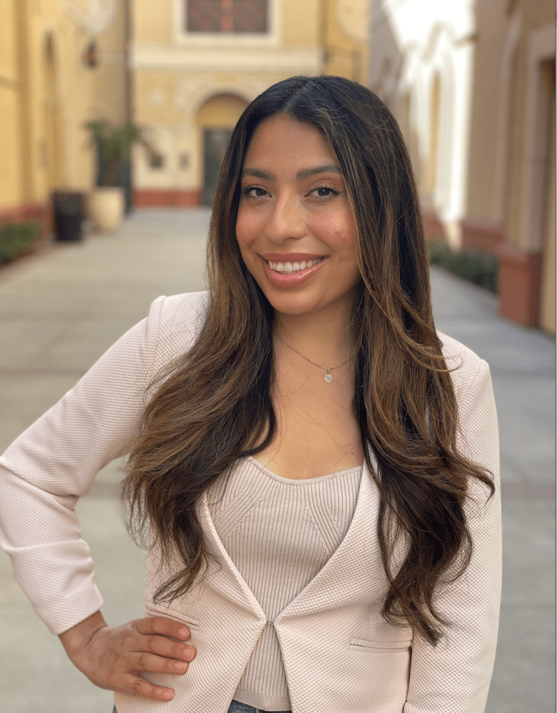 Natalie Torres' Headshot image as she stands up.